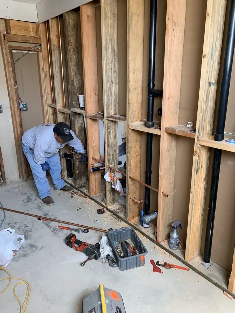 Commercial rough-in plumbing for Water Heater Replacement in King Heights
